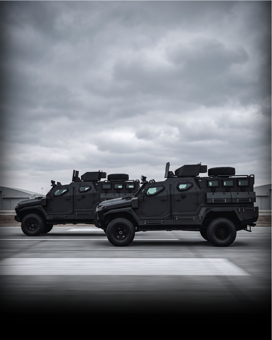 Two F550 armored personnel carriers on an airfield
